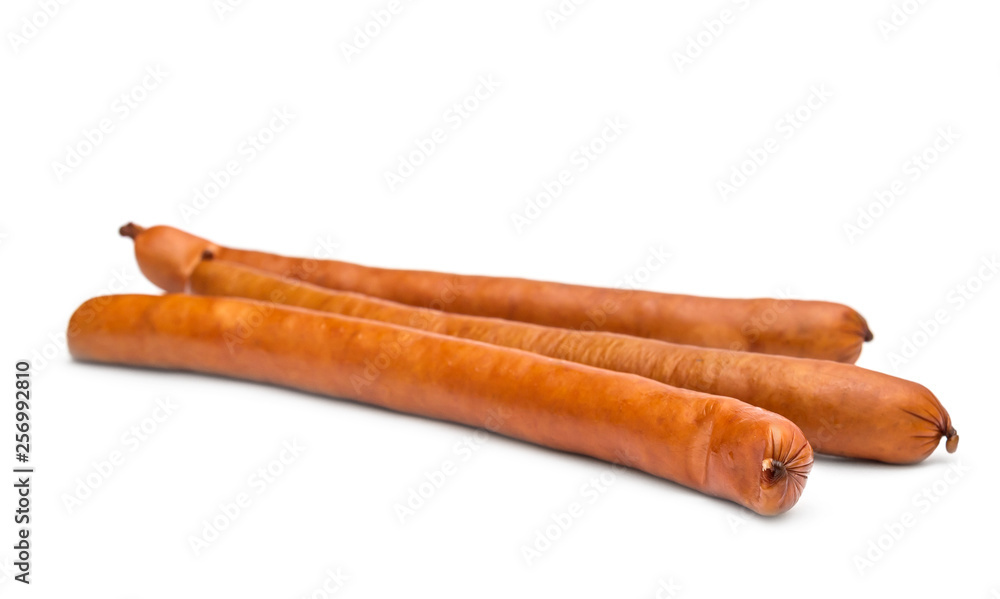 Heap of thin smoked sausage on white.