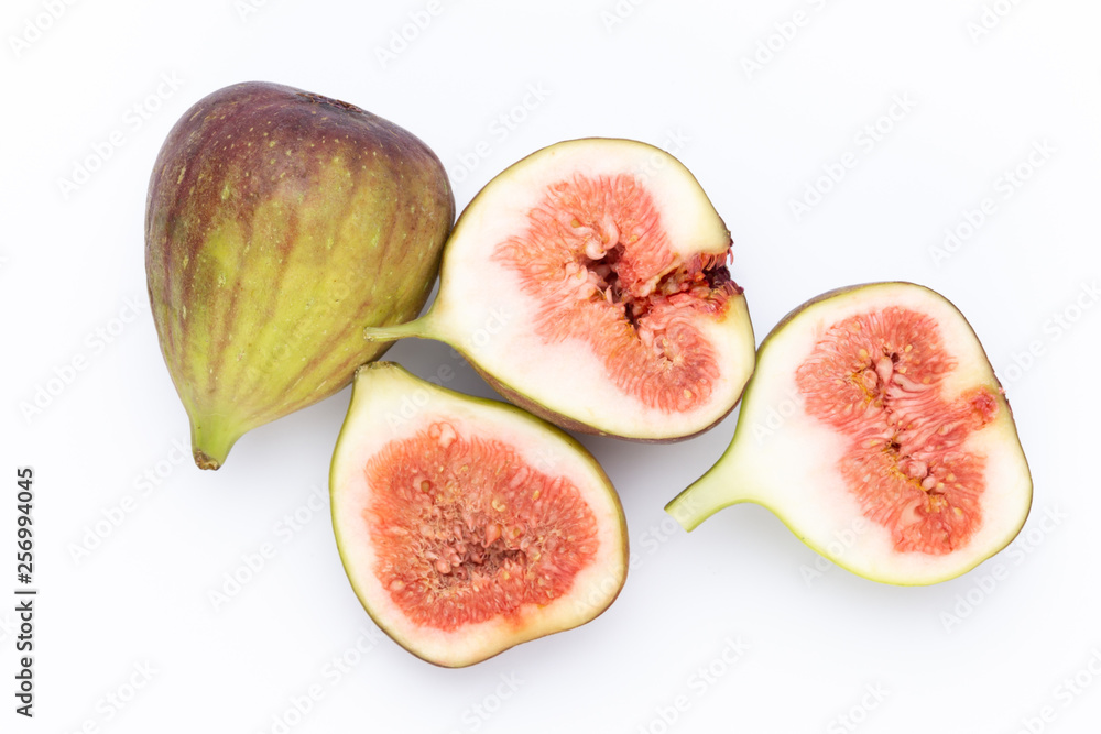 Fig fruits isolated on white background. Top view. Flat lay pattern Fig fruits isolated on white background. Top view. Flat lay pattern