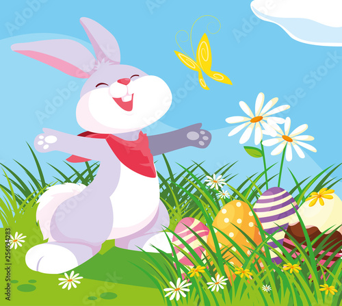 cute rabbit with eggs of easter in garden