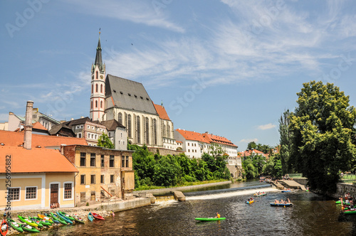 Paddlers on the river in Czech Krumlov (Cesky Krumlov). Stop for boaters floating on the river Vltava in South Bohemia. Paddlers in Cesky Krumlov - UNESCO World Heritage Site.