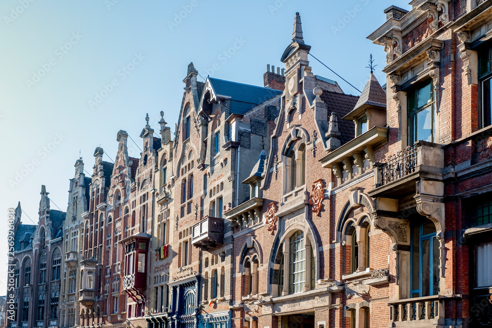 Facades of buildings on a street of Ghent in Belgian Flanders