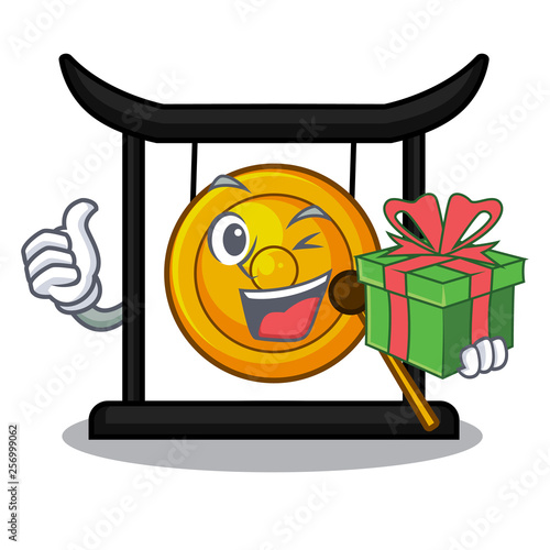 With gift golden gong isolated with the mascot