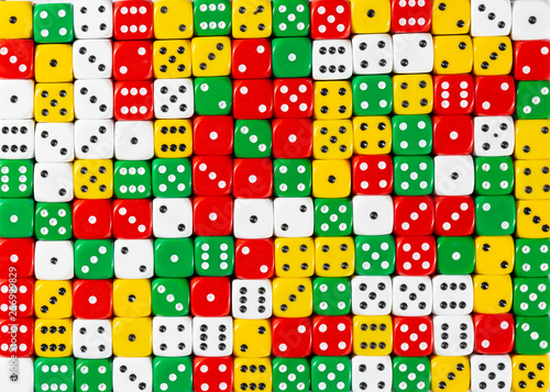 Pattern of random ordered red, white, yellow and green dices
