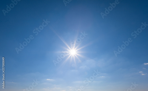 sparkle sun on the blue sky, natural background