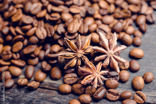 Coffee beans on the wooden table. Selective focus. Shallow depth of field.