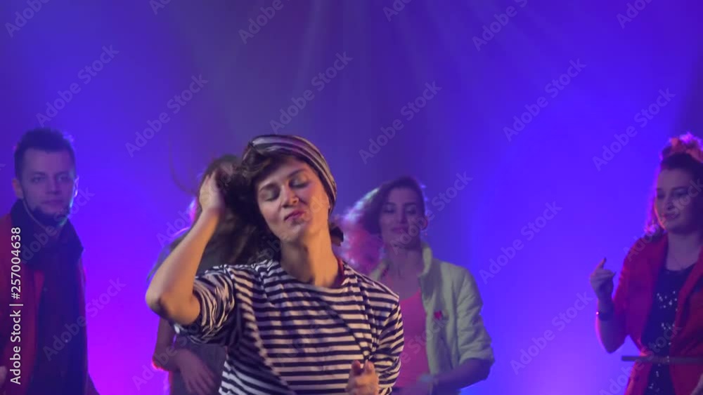 Friends dancing at a party having a night Friends dancing at a party having a night