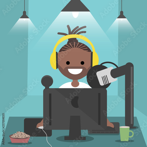 Young character sitting at computer desk.Streaming.Cloud gaming service.Flat cartoon design.Clip art