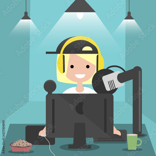 Young character sitting at computer desk.Streaming.Cloud gaming service.Flat cartoon design.Clip art