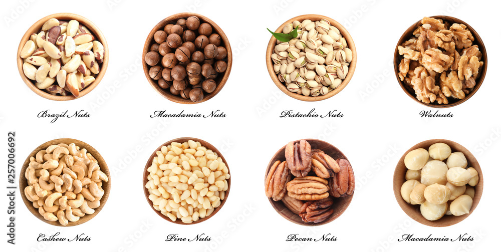 Set of bowls with different organic nuts on white background, top view Set of bowls with different organic nuts on white background, top view