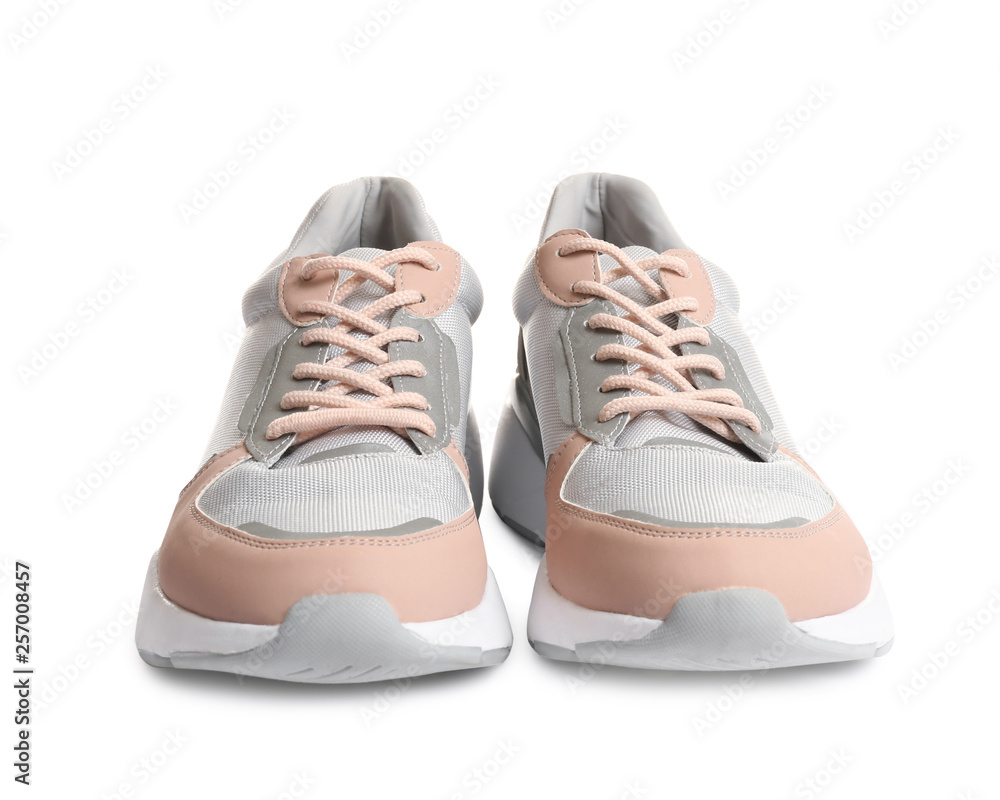 Pair of sports shoes on white background