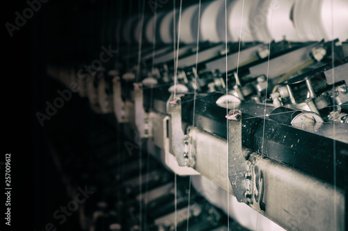 Textile yarn twisting mill. close-up machine