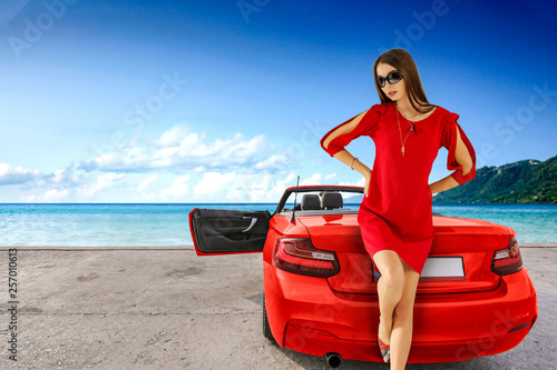 Red sport summer car and slim young woman in dress.  © magdal3na