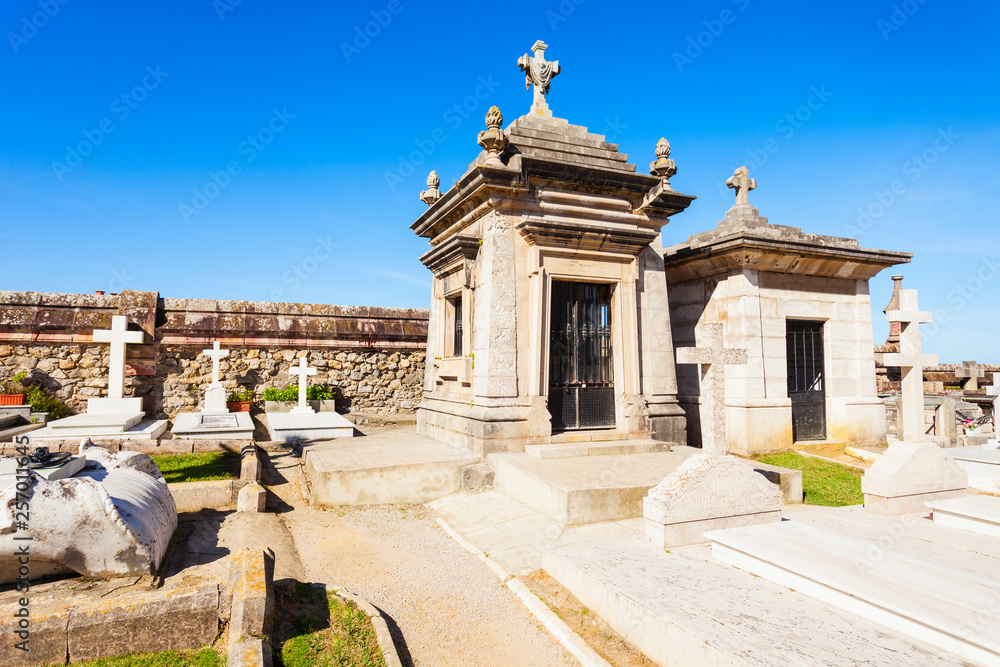 Obraz premium Old cemetery and church, Comillas