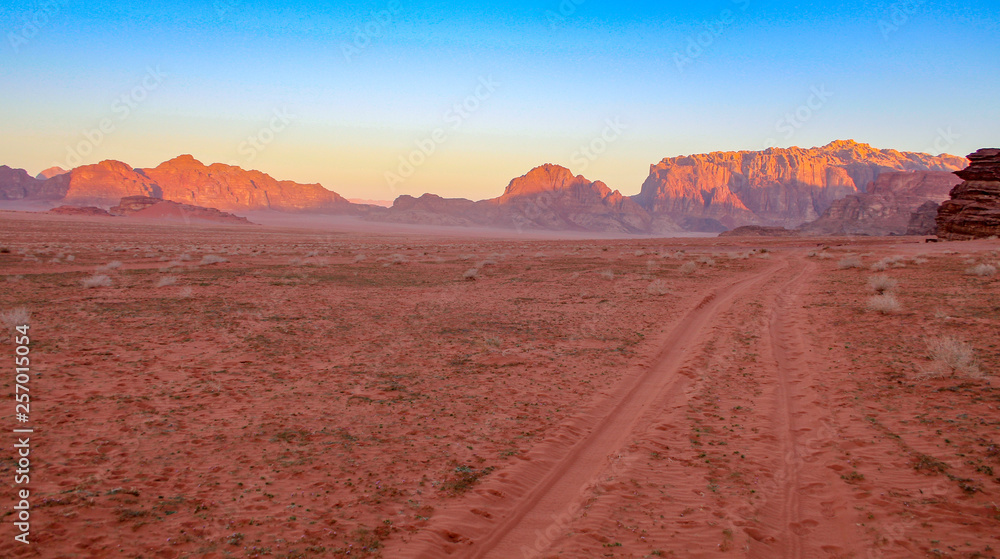 Desert trail in Wadi Rum Jordan at sunset