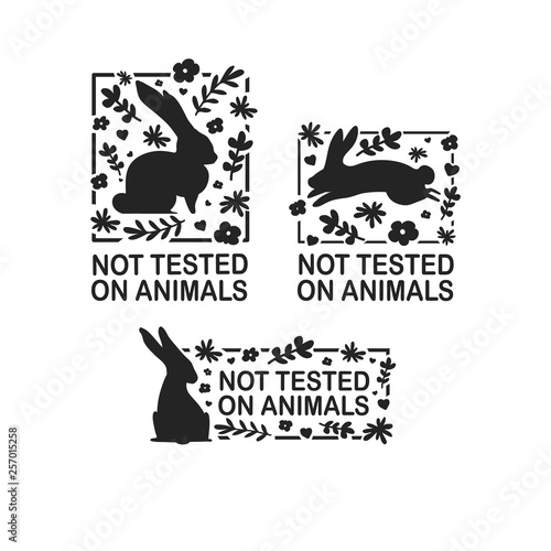 Set animal logo cruelty free. Sign with silhouette rabbit and flower and nature leaf. Design stapm for product not tested on animals. Layout Badge for natural cosmetic.  Vector symbol.