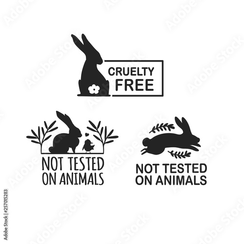 Set animal logo cruelty free. Sign with silhouette rabbit and flower and nature leaf. Design stapm for product not tested on animals. Layout Badge for natural cosmetic.  Vector symbol.