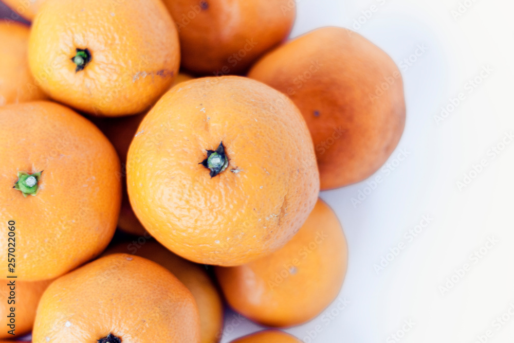 Fresh whole mandarin oranges background , top view. Fresh whole mandarin oranges background , top view.