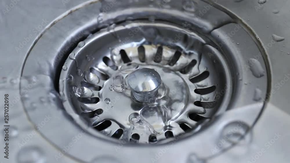 Close-up of kitchen sink with water drops Close-up of kitchen sink with water drops