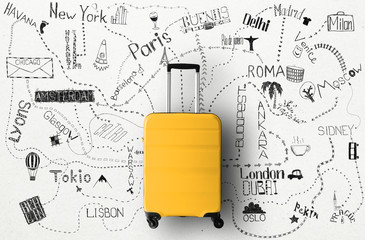 Travel concept with a large suitcase and other accessories