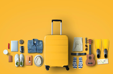 Travel concept with a large suitcase and other accessories
