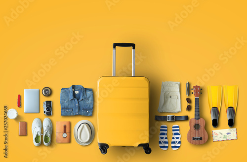 Fotografie, Obraz Travel concept with a large suitcase and other accessories