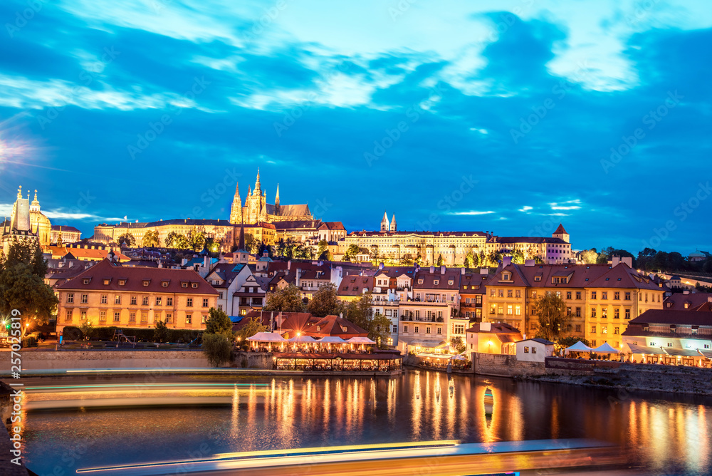 The beautiful landscape of the old town and the Hradcany (Prague Castle) with St. Vitus Cathedral and St. George church in Prague, Czech Republic at night. amazing places. popular tourist atraction