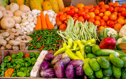 fresh vegetables on a market counter