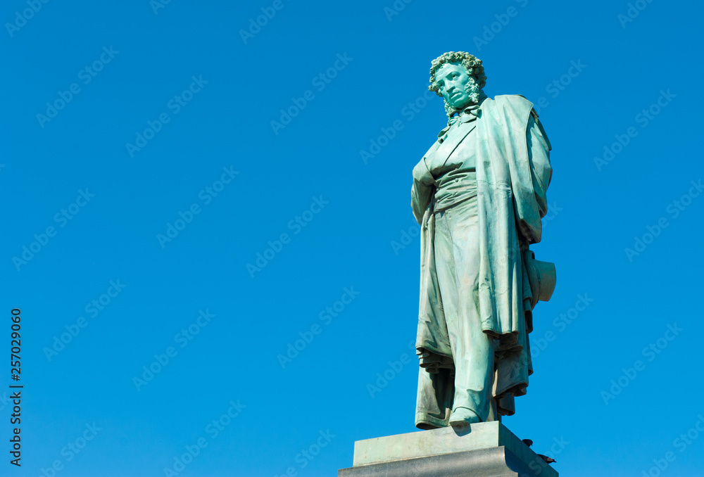 Monument to Alexander Pushkin against blue sky. Moscow. Russia