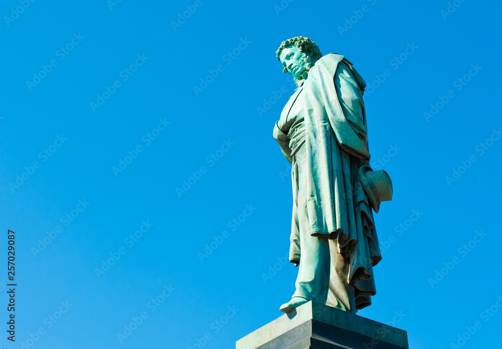 Fototapeta premium Monument to Alexander Pushkin against blue sky. Moscow. Russia