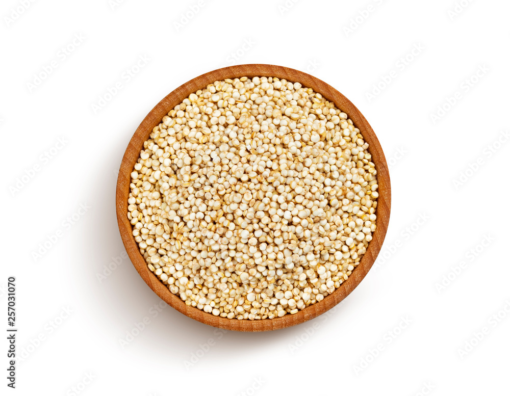 Wooden bowl of quinoa seeds isolated on white background, top view Wooden bowl of quinoa seeds isolated on white background, top view