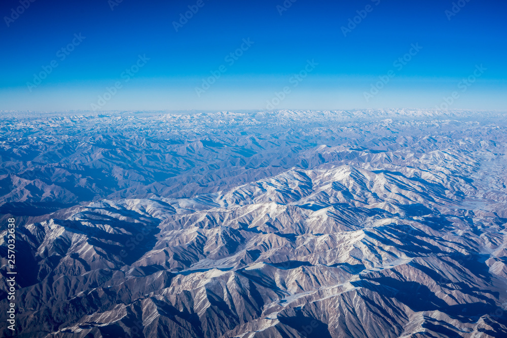 Obraz premium Aerial Mountain view from airplane