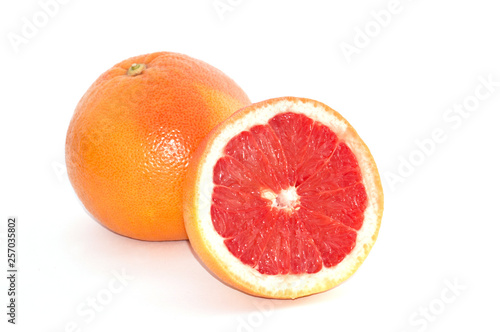 Ripe grapefruit on a white background close-up macro copy space