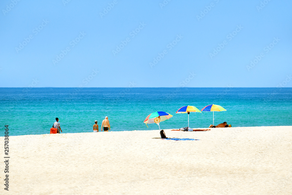 Beach summer umbrellas. Travel background with copy space. Beach summer umbrellas. Travel background with copy space.