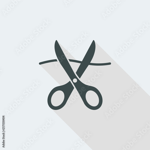 Scissors cutting thread