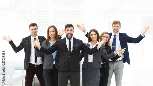portrait of happy business team on office background