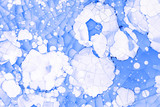 Abstract blue background with cracks and spots