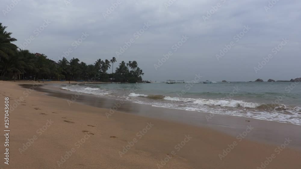 View of Indian Ocean from Hikkaduwa Beach in Hikkaduwa, Sri Lanka. Popular touristic asian destination. Seascape. Landscape. Vacation destination View of Indian Ocean from Hikkaduwa Beach in Hikkaduwa, Sri Lanka. Popular touristic asian destination. Seascape. Landscape. Vacation destination