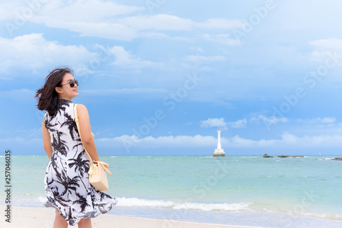 Woman tourist on the beach in Thailand