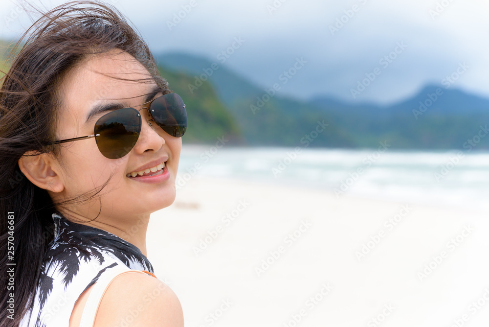 Beautiful woman tourist on the beach in Thailand