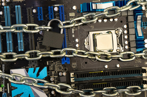 censorship, restrictions and restrictions on a Internet. concept, motherboard in chains under lock and key