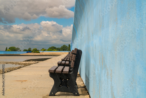 Empty benches on Canvey Island, near Southend-on-Sea, Essex, England, UK photo