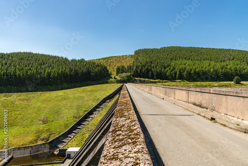 Road over the dam of Nant-y-Moch Reservoir, Ceredigion, Dyfed, Wales, UK