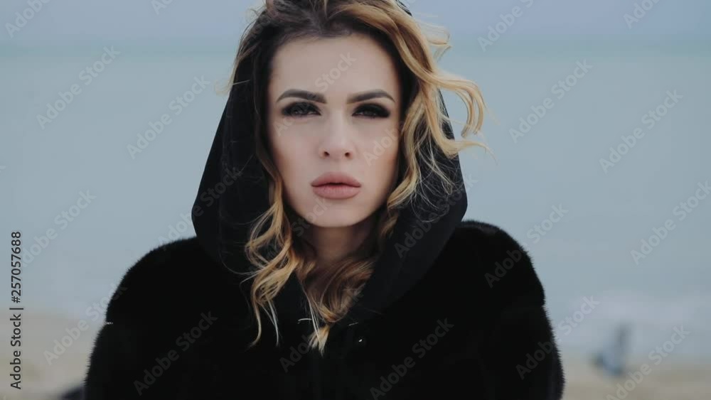 A strong look into the camera of a lonely manly girl. Drugs, loneliness, addiction, depression A strong look into the camera of a lonely manly girl. Drugs, loneliness, addiction, depression