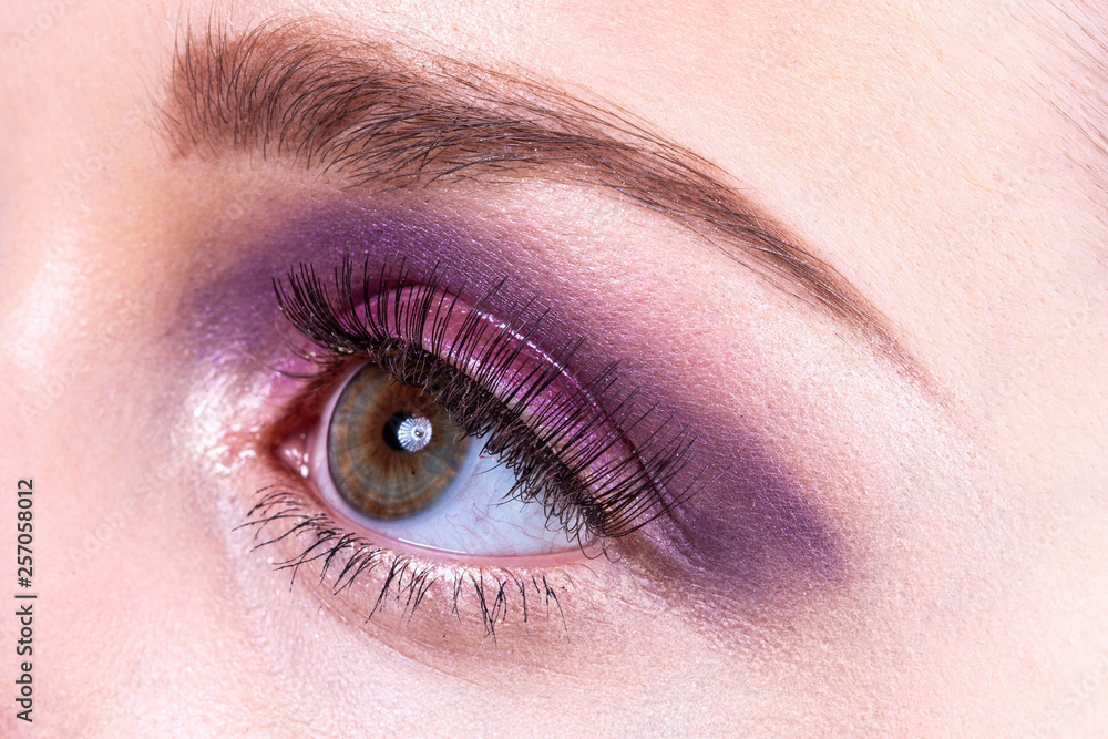 Close-up of the eye with artificial eyelashes.