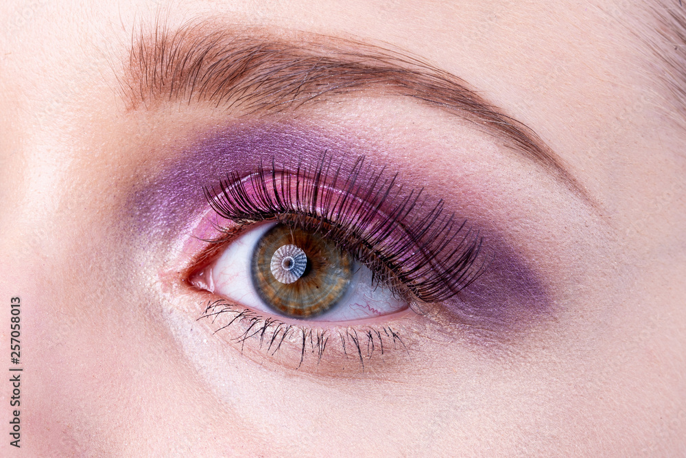 Fototapeta premium Close-up of the eye with artificial eyelashes.