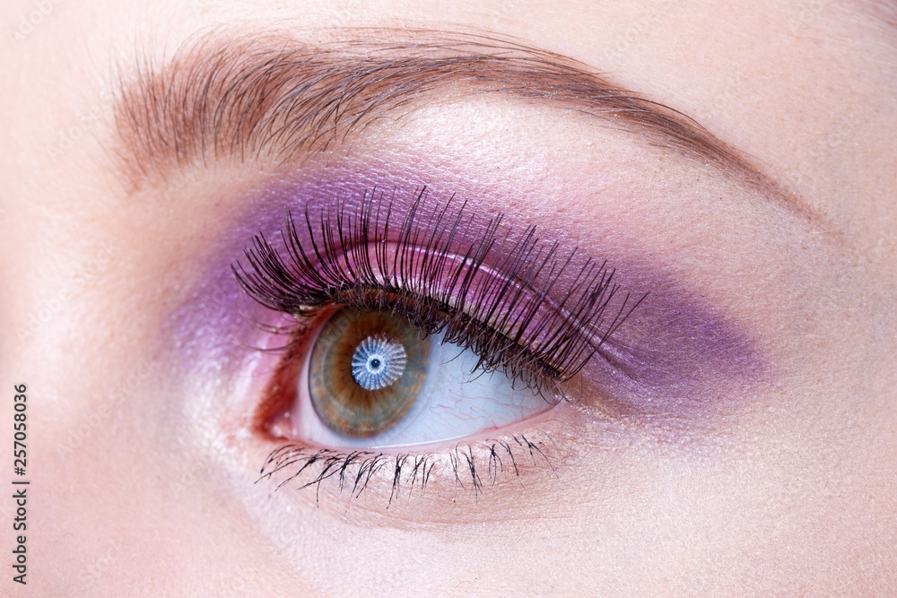 Close-up of the eye with artificial eyelashes.