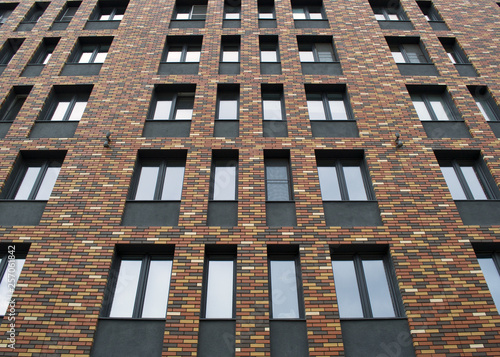 brick wall building with windows