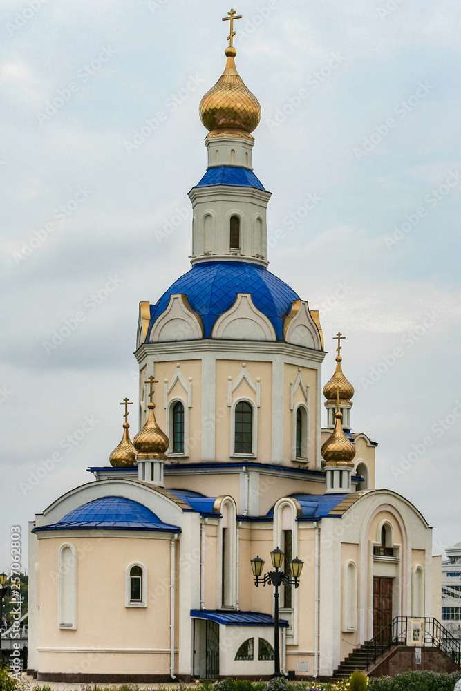 Russian Orthodox Church of St. Archangel Gabriel on the campus of the National Belgorod University. Orthodox church golden domes and crosses
