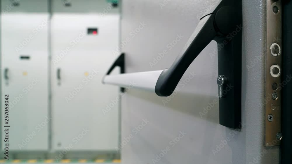 Door handle with lock close-up. Modular power station. Door handle with lock close-up. Modular power station.