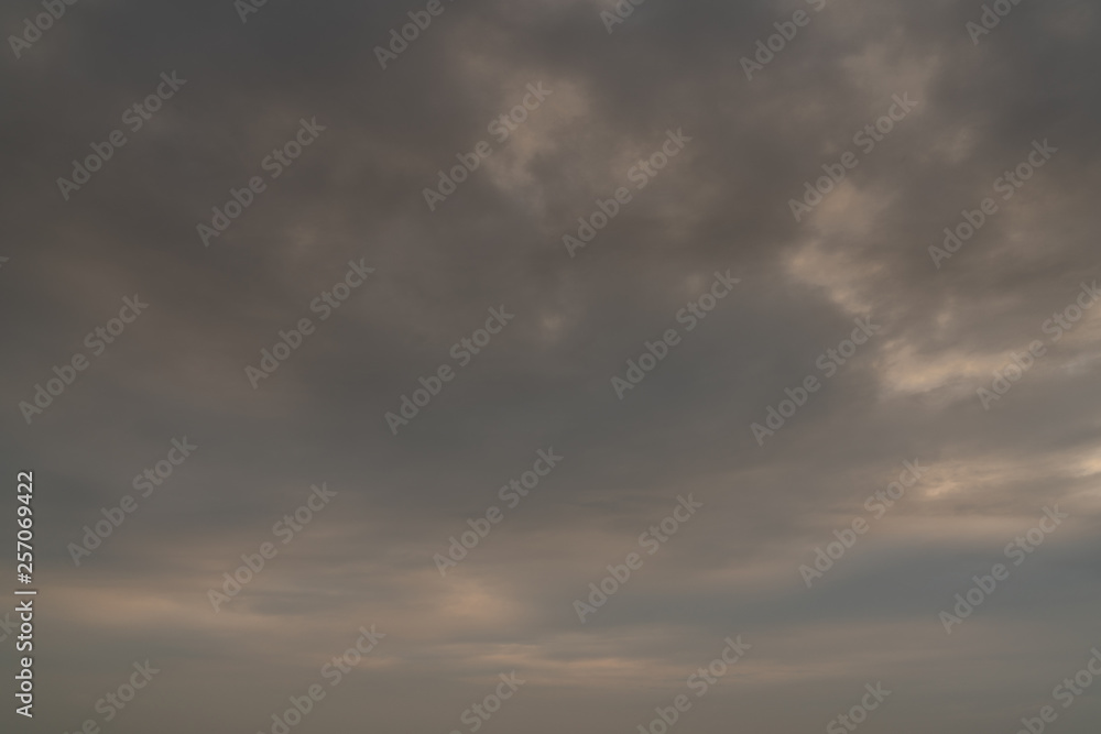 Cloudy sunset sky background